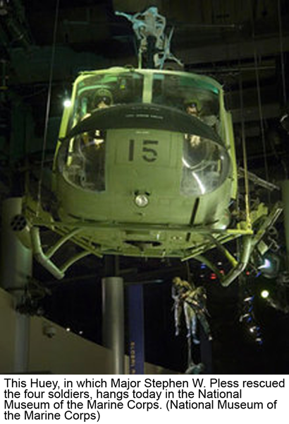 This Huey, in which Major Stephen W. Pless rescued the four soldiers, hangs today in the National Museum of the Marine Corps. (National Museum of the Marine Corps)