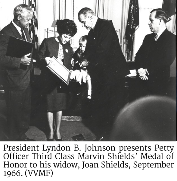 President Lyndon B. Johnson presents Petty Officer Third Class Marvin Shields’ Medal of Honor to his widow, Joan Shields