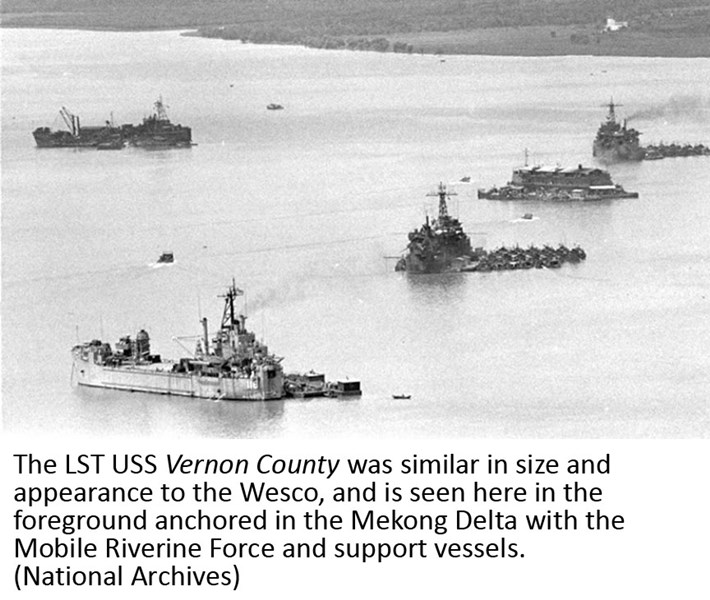 The LST USS Vernon County was similar in size and appearance to the Wesco, and is seen here in the foreground anchored in the Mekong Delta with the Mobile Riverine Force and support vessels. (National Archives)