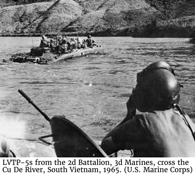 LVTP-5s from the 2d Battalion, 3d Marines, cross the Cu De River, South Vietnam, 1965. (U.S. Marine Corps)