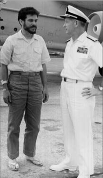 Lieutenant Charles Klusmann with Vice Admiral Roy L. Johnson, Commander Seventh Fleet, in September 1964, after Klusmann's escape from captivity in Laos. (U.S. Navy)
