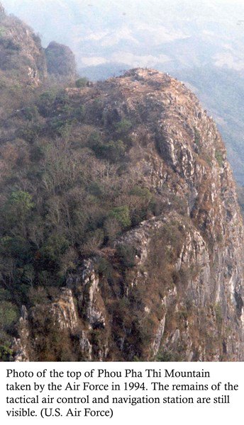 Photo of the top of Phou Pha Thi Mountain taken by the Air Force in 1994. The remains of the tactical air control and navigation station are still visible. (U.S. Air Force)