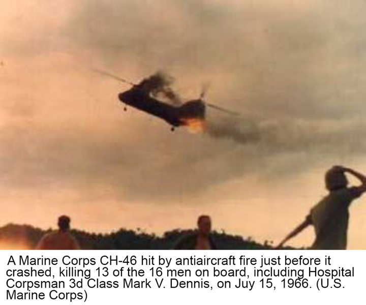 A Marine Corps CH-46 hit by antiaircraft fire just before it crashed, killing 13 of the 16 men on board, including Hospital Corpsman 3d Class Mark V. Dennis, on July 15, 1966. (U.S. Marine Corps)