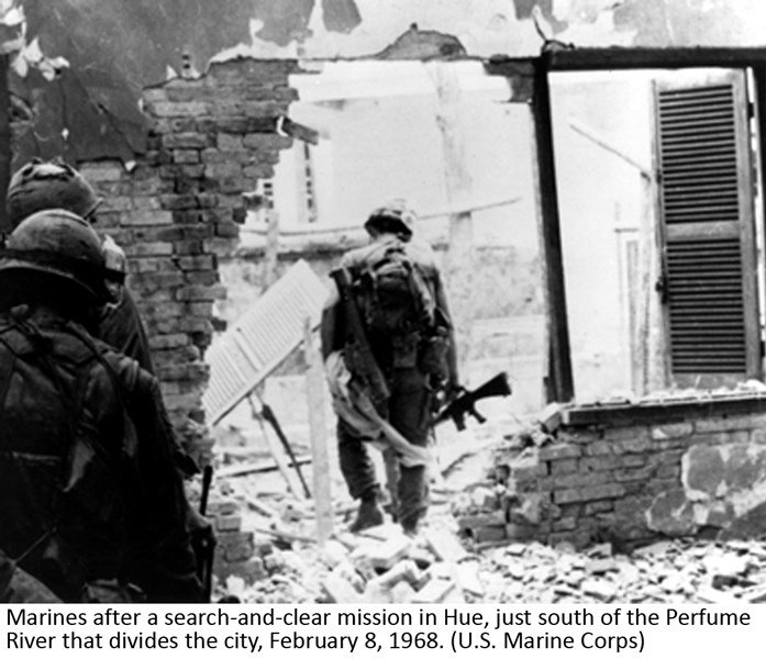 Marines after a search-and-clear mission in Hue, just south of the Perfume River that divides the city, February 8, 1968. (U.S. Marine Corps)