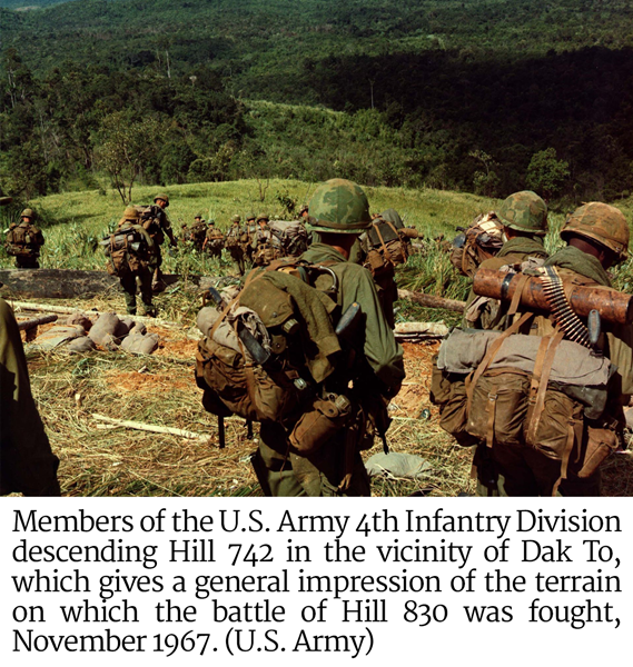 Members of the U.S. Army 4th Infantry Division descending Hill 742 