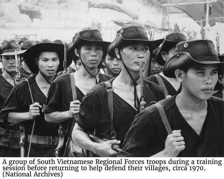 A group of South Vietnamese Regional Forces troops during a training session before returning to help defend their villages, circa 1970. (National Archives)
