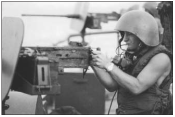 Point Banks crewmen fire M-2 .50-caliber machine guns 
