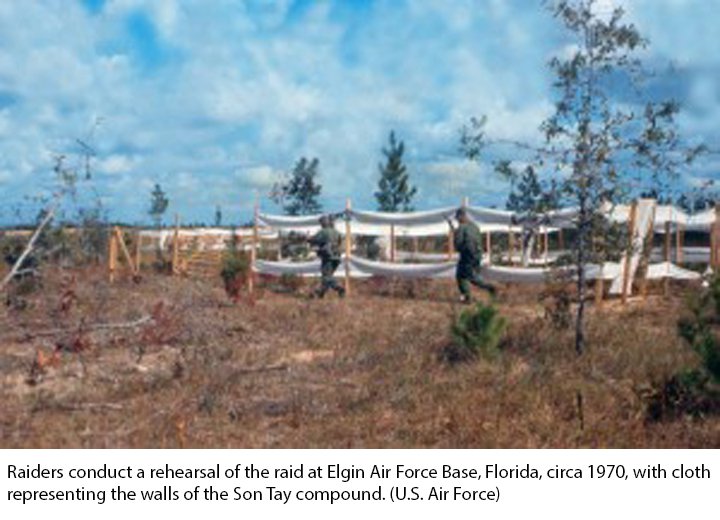 Raiders conduct a rehearsal of the raid at Elgin Air Force Base, Florida, circa 1970, with cloth representing the walls of the Son Tay compound. (U.S. Air Force)