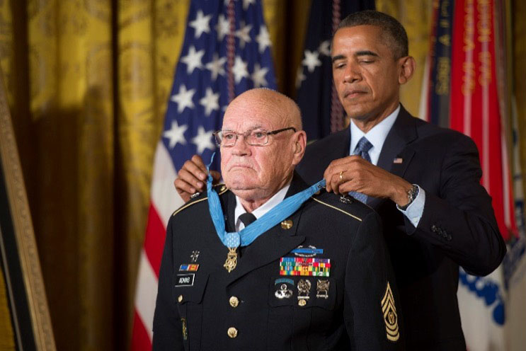 Sergeant Major Bennie Gene Adkins receives the Medal of Honor from 44th U.S. President Barack Obama during a White House ceremony in 2014. (U.S. Army)