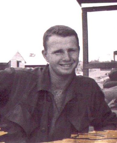 Photo of Specialist 5 Dennis Francis Moore while in the U.S. Army.