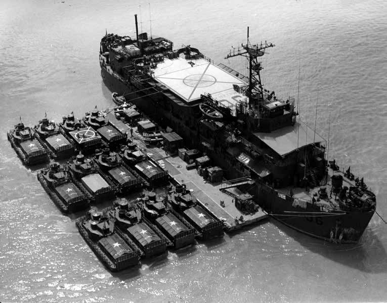 McCain waiting with his fellow ex-POWs at a Saigon airport just after their release, 1973.