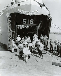 Vietnamese Refugees Board a US Navy Vessel