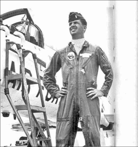 Photo of First Lieutenant Wallace L. Wiggins standing next to his aircraft